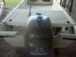 -small-2002-carolina-skiff-nissan-outboard-rig.jpg