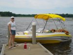 dusty holds boat.jpg