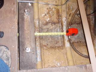 about 43" of open space for belly tank ahead of engine mount crossmember